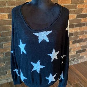 Size large black and white star sweater
